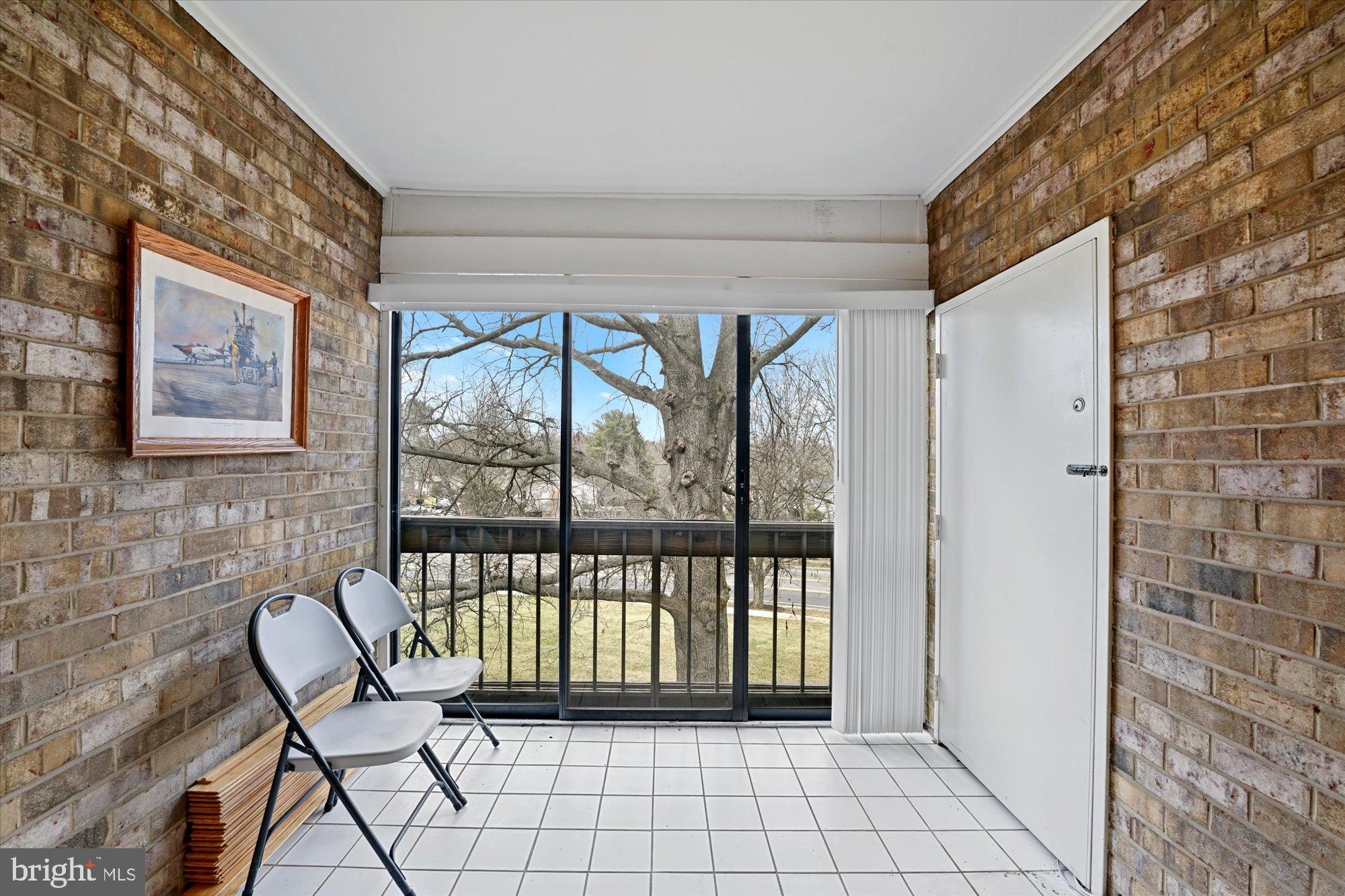 10578 Cross Fox Lane, Unit E2 Columbia, MD 21044 - Photo 6 of 28 a view of a balcony with chairs