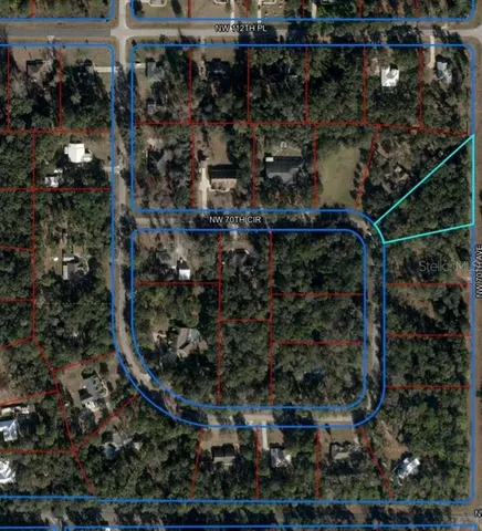 an aerial view of house with yard