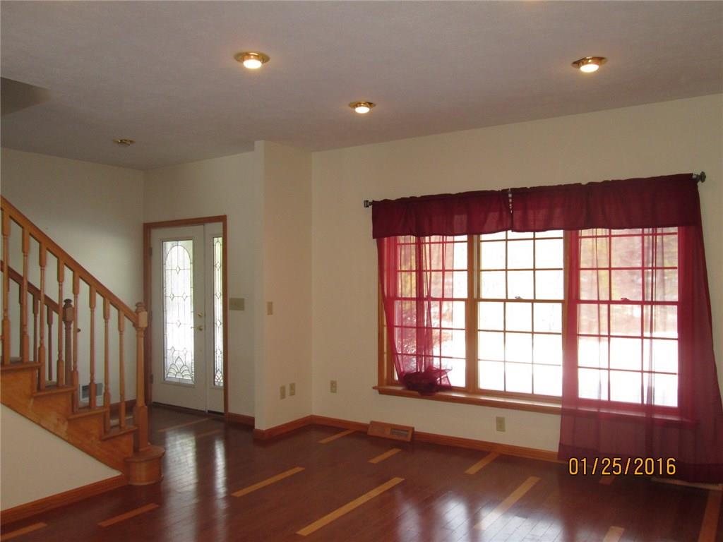 335 Myoma Road Mars, PA 16046 - Photo 2 of 20 Large Bright Living Room with recessed lighting, custom hardwood floor with light inlays, large Pella windows,