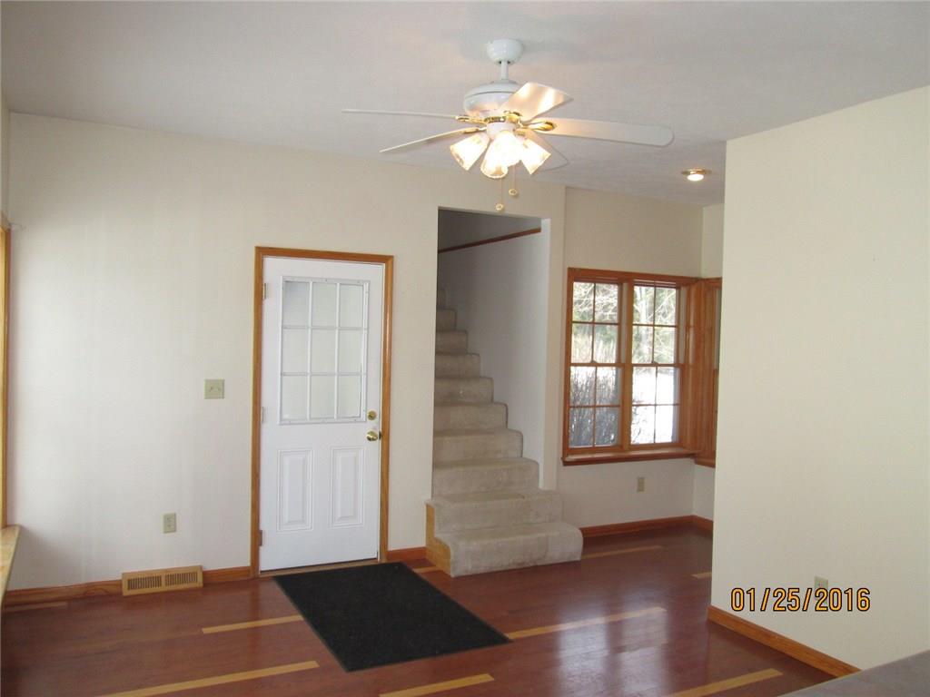 335 Myoma Road Mars, PA 16046 - Photo 6 of 20 Kitchen eating area with door to steps to garage. Carpeted steps to guest suite with bedroom and full bath