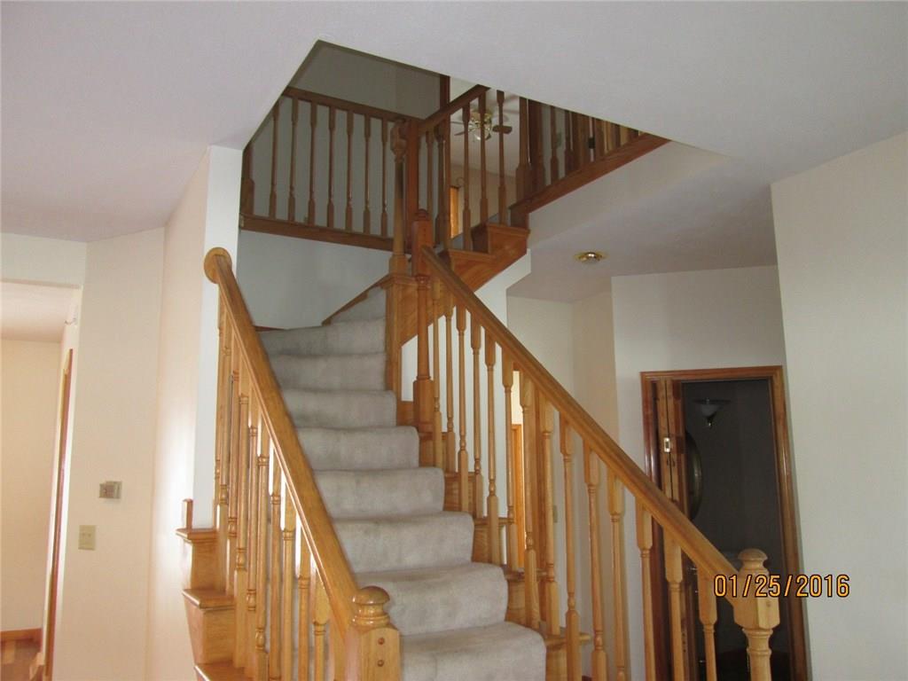 335 Myoma Road Mars, PA 16046 - Photo 10 of 20 Stairway to second floor. Door to right of stairs is to first-floor powder room.