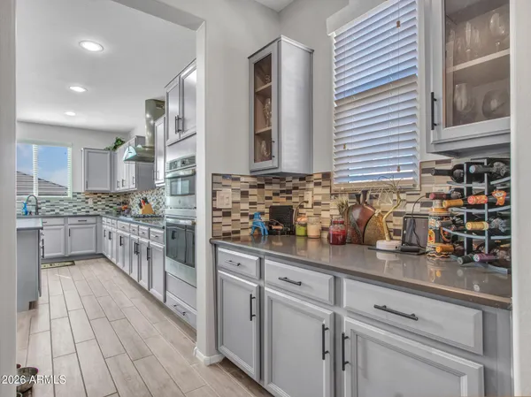 a kitchen with a sink and a window