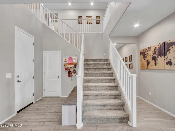 a en suite bathroom with a double vanity sink mirror and