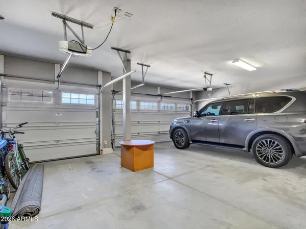 a view of a house with backyard porch and sitting area