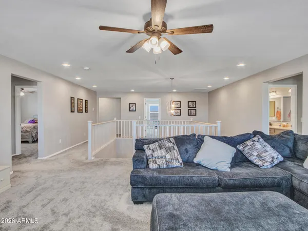 an aerial view of a houses with a ocean view