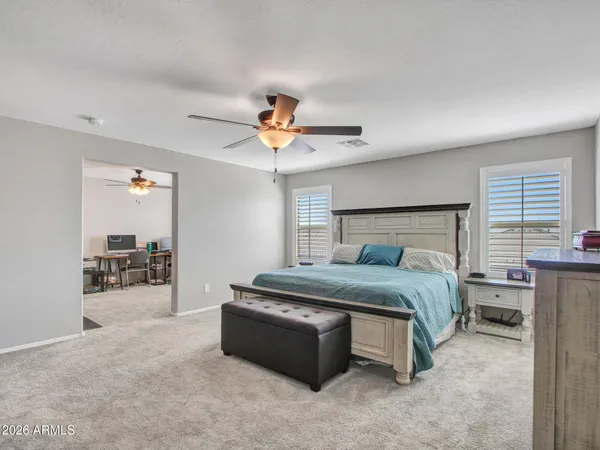 a view of a city with mountains in the background