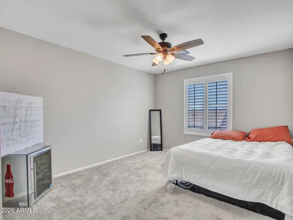 a view of multiple houses with a swimming pool