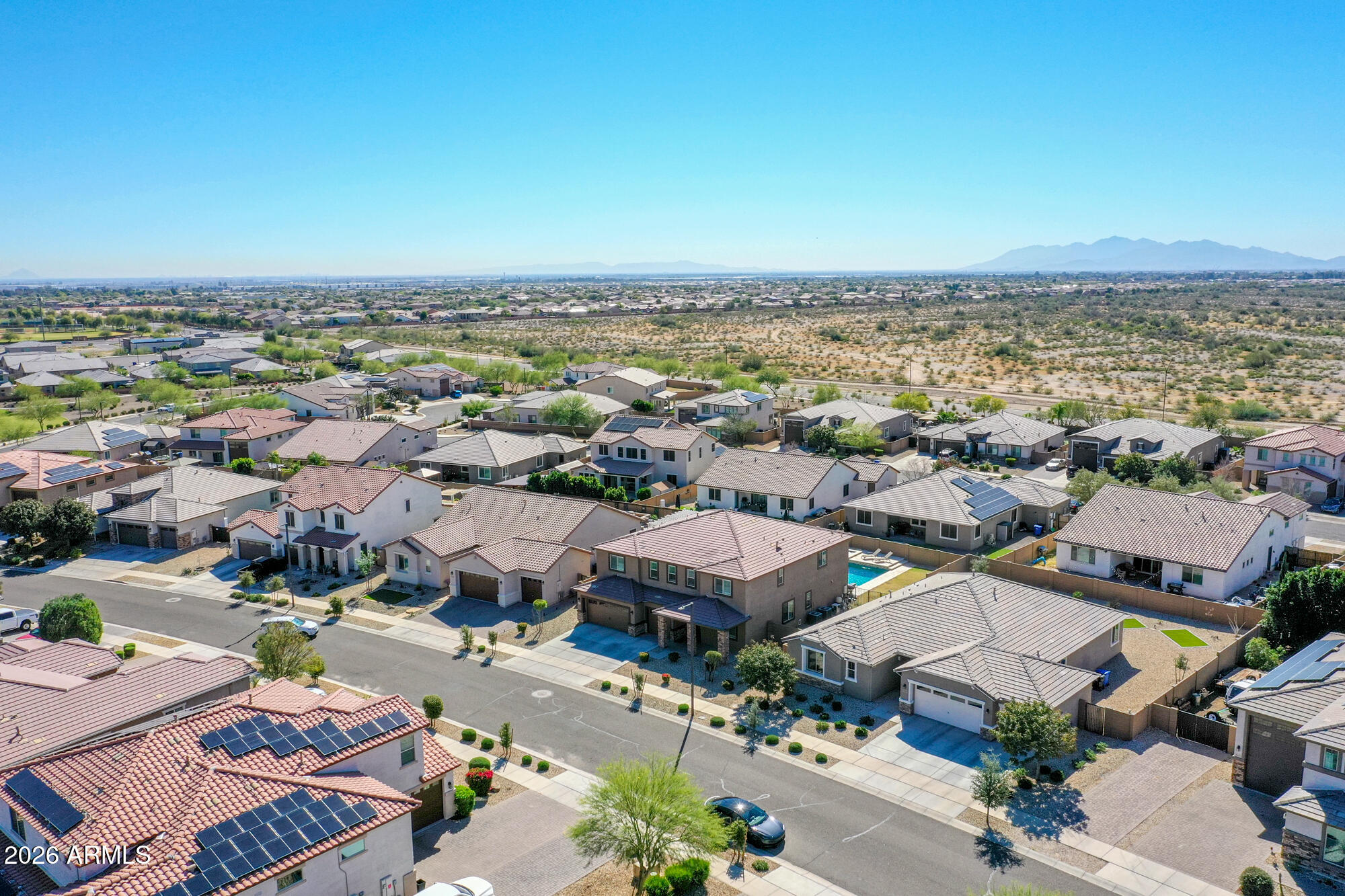 18971 West Clinton Street Surprise, AZ 85388 - Photo 74 of 91 an aerial view of a city with lots of residential buildings