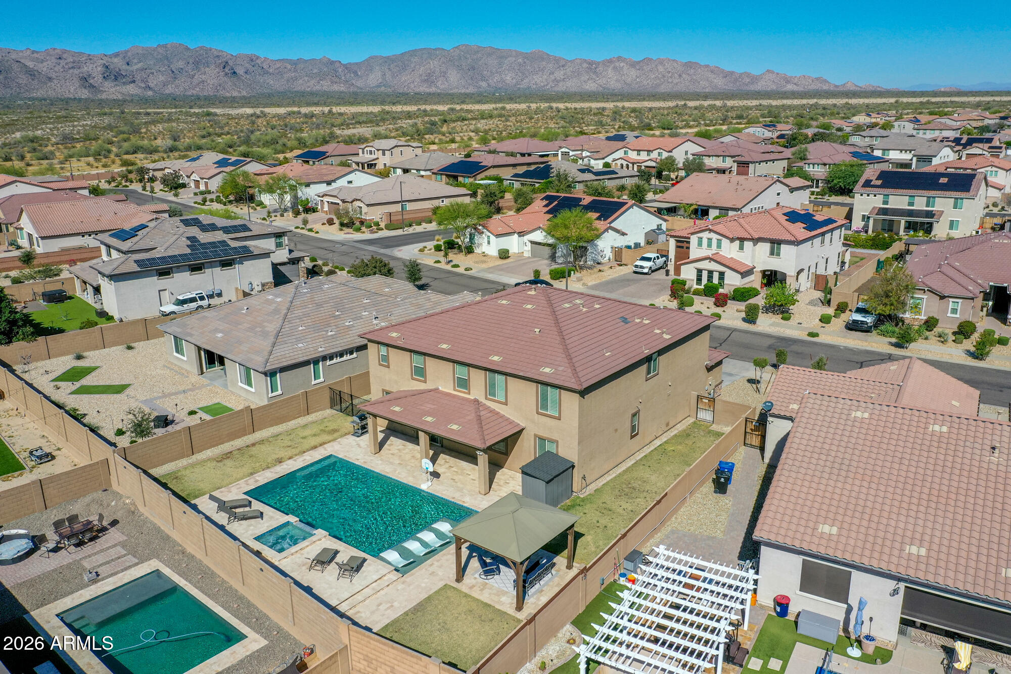 18971 West Clinton Street Surprise, AZ 85388 - Photo 81 of 91 an aerial view of residential houses with outdoor space and city view