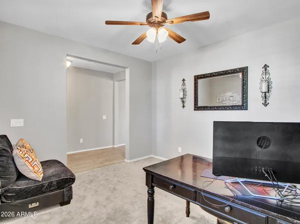 a kitchen with stainless steel appliances granite countertop a refrigerator a stove and a sink with cabinets