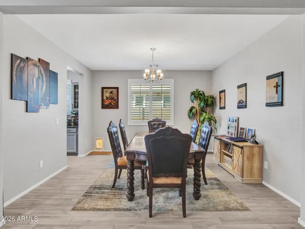 a kitchen with a stove a sink and cabinets
