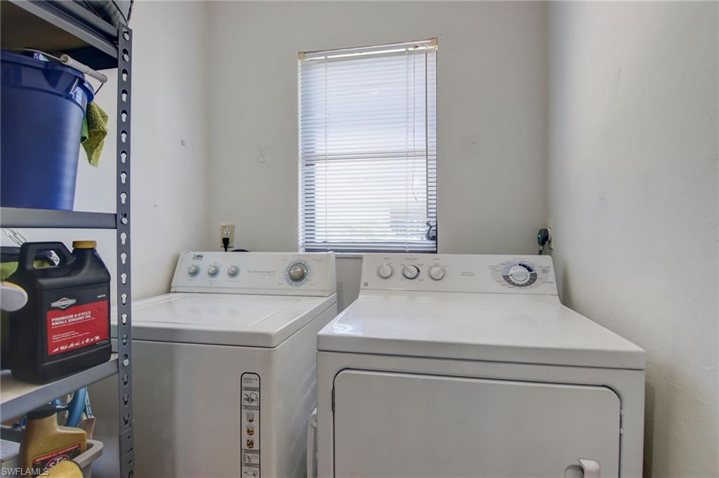 4209 Skyline Boulevard, Unit 4209 Cape Coral, FL 33914 - Photo 21 of 23 a utility room with dryer and washer