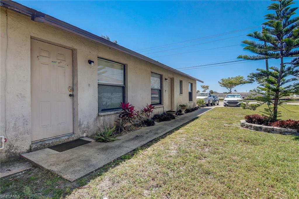 4209 Skyline Boulevard, Unit 4209 Cape Coral, FL 33914 - Photo 4 of 23 a view of a house with a patio