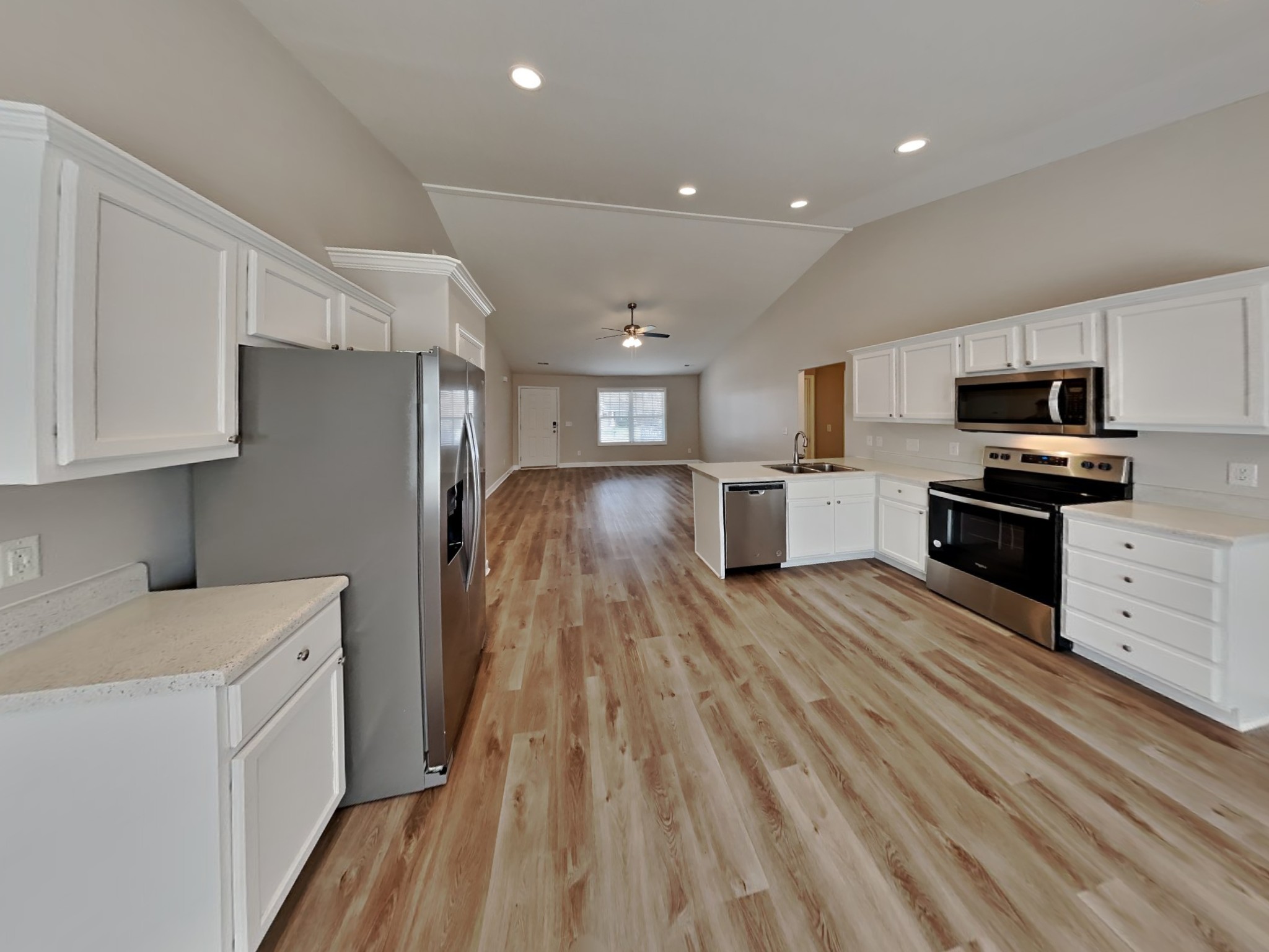 5003 Morning Dove Lane Spring Hill, TN 37174 - Photo 6 of 15 a kitchen with cabinets and wooden floor