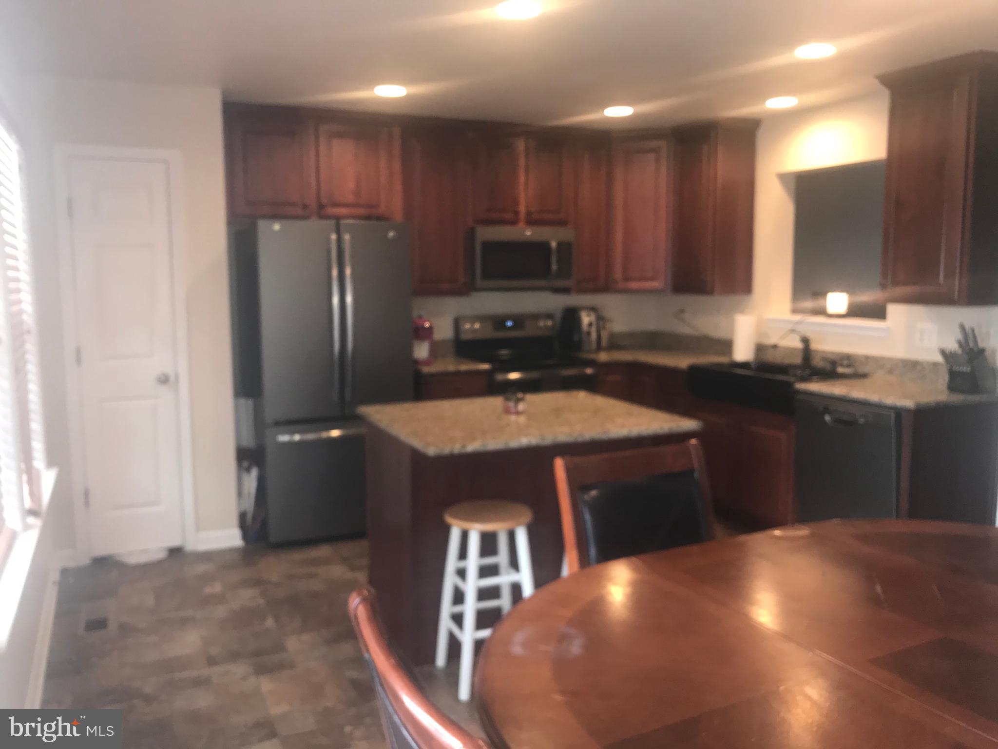 1137 Mare Street Ranson, WV 25438 - Photo 12 of 42 Kitchen cabinets that reach to the ceiling