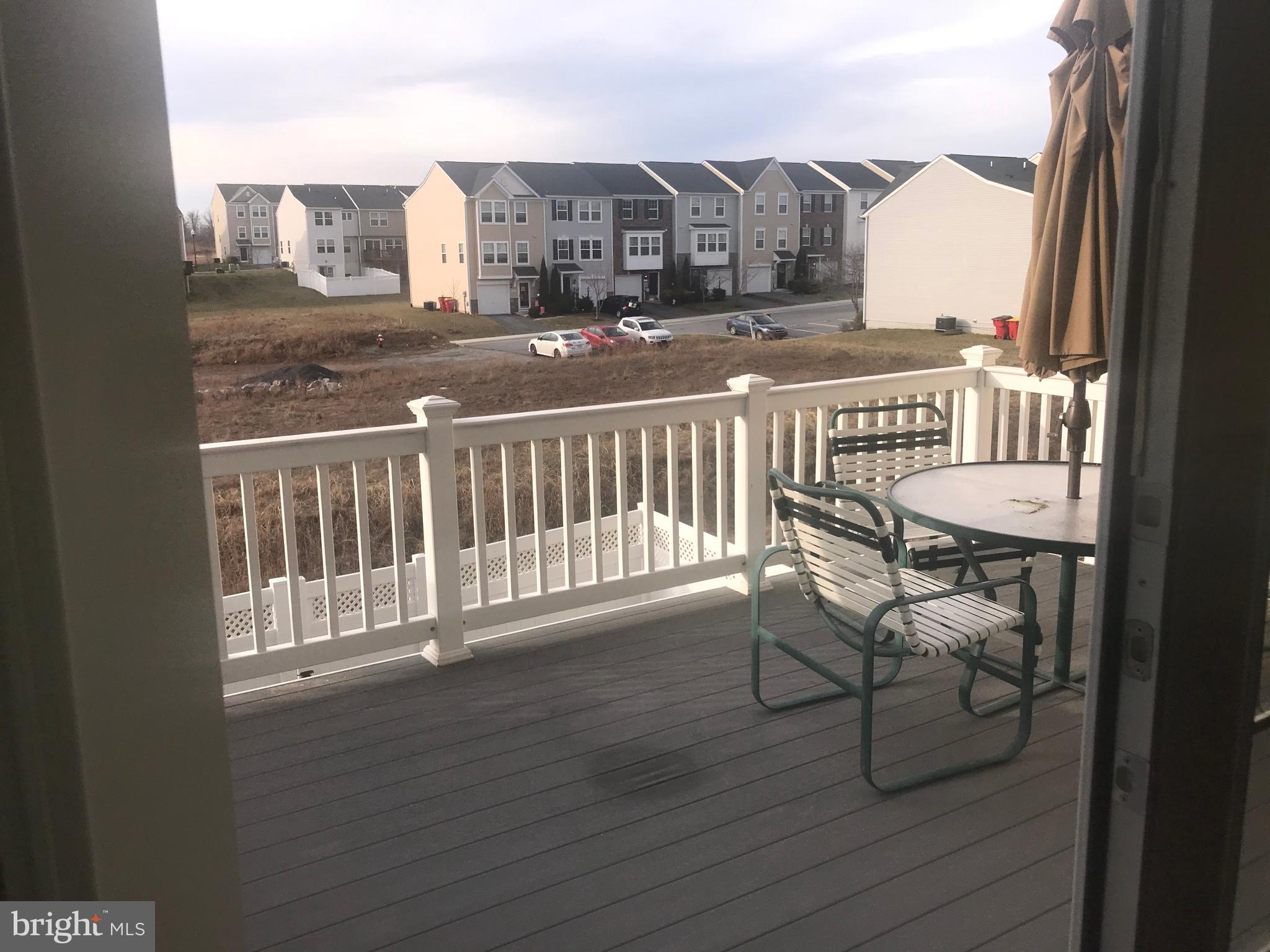 1137 Mare Street Ranson, WV 25438 - Photo 16 of 42 View out of kitchen doors onto trex decking