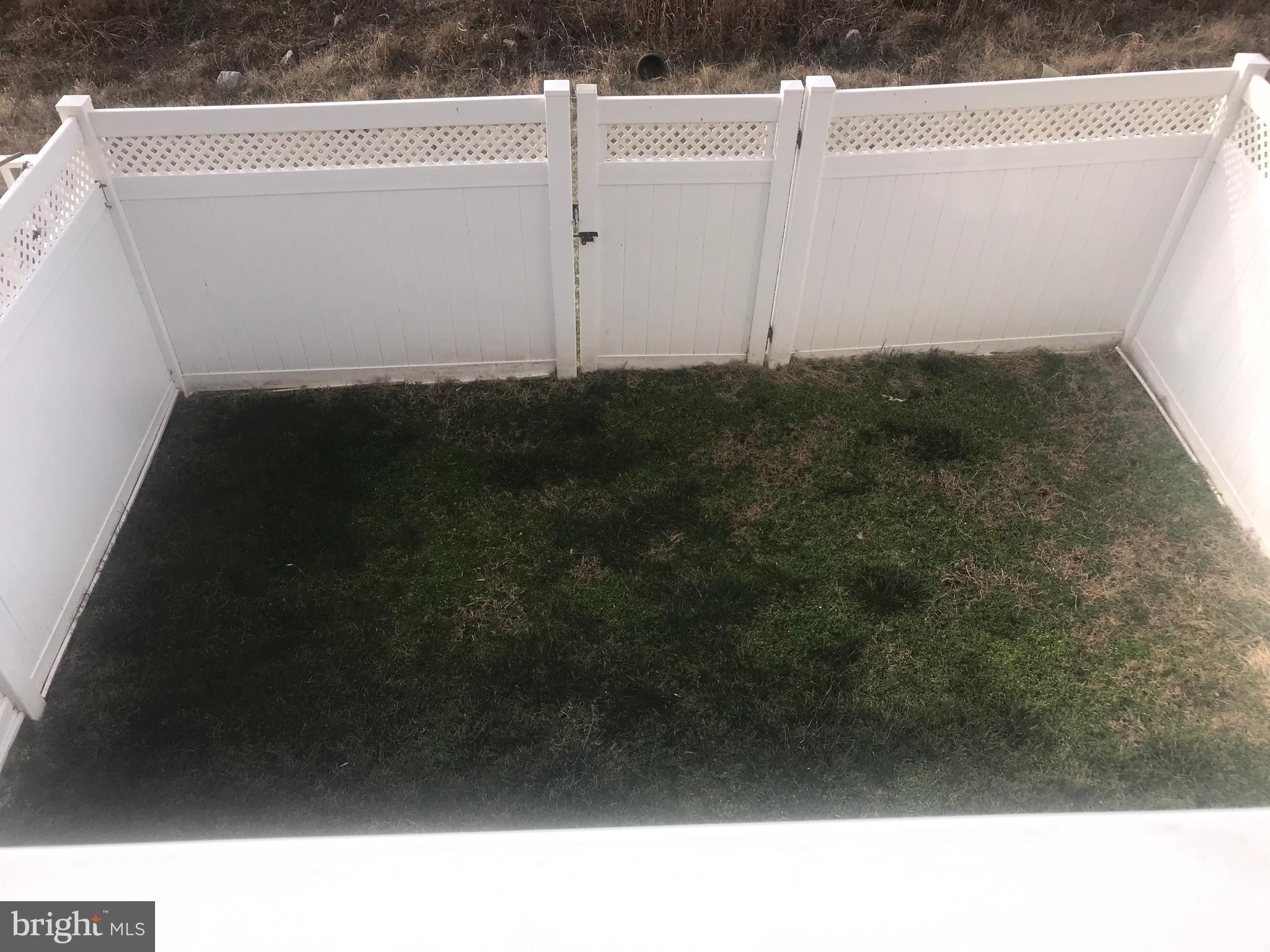 1137 Mare Street Ranson, WV 25438 - Photo 18 of 42 Back yard with vinyl privacy fence and gate