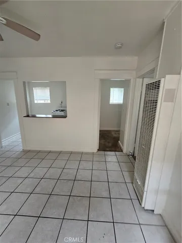 a view of a livingroom and window