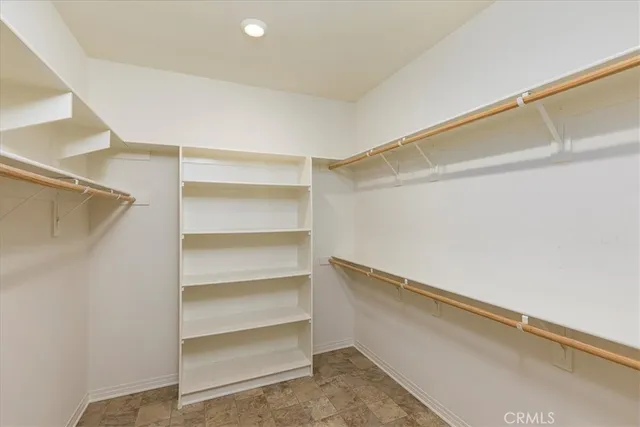 a view of an empty walk in closet