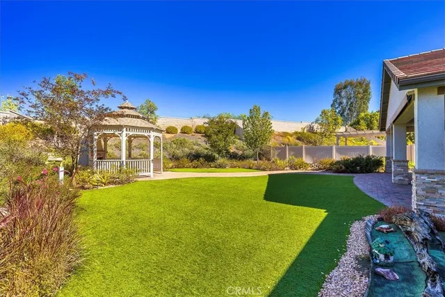 a view of a house with a big yard