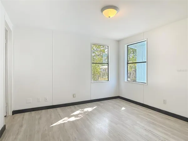 an empty room with windows