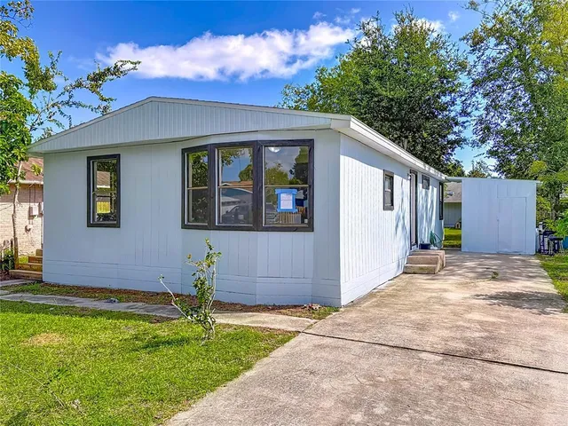 a house with yard in front of it