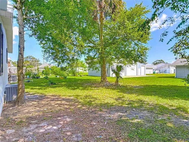 a view of swimming pool with tree s
