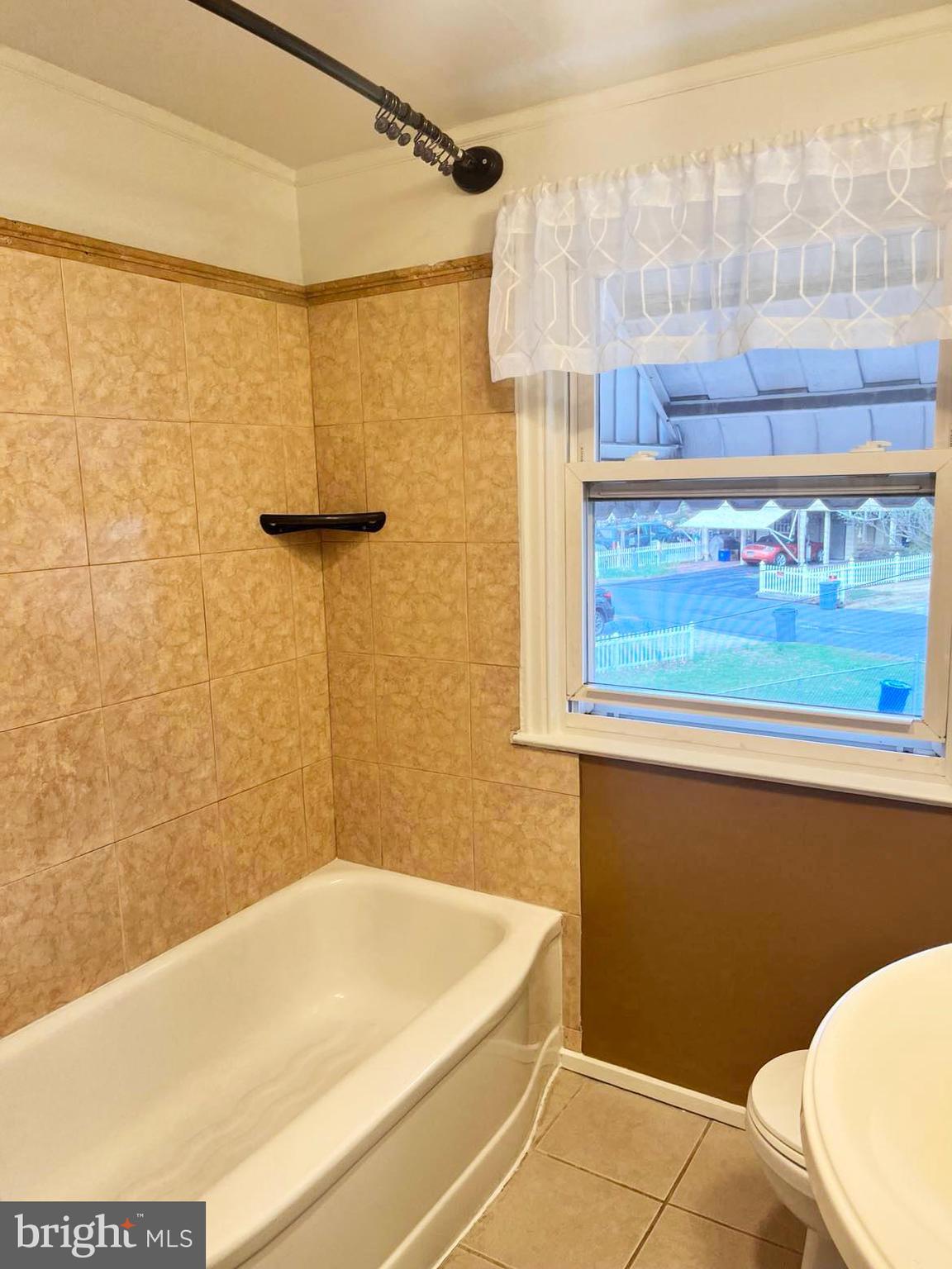 210 Sycamore Road Reading, PA 19611 - Photo 12 of 16 a bathroom with a bathtub and shower