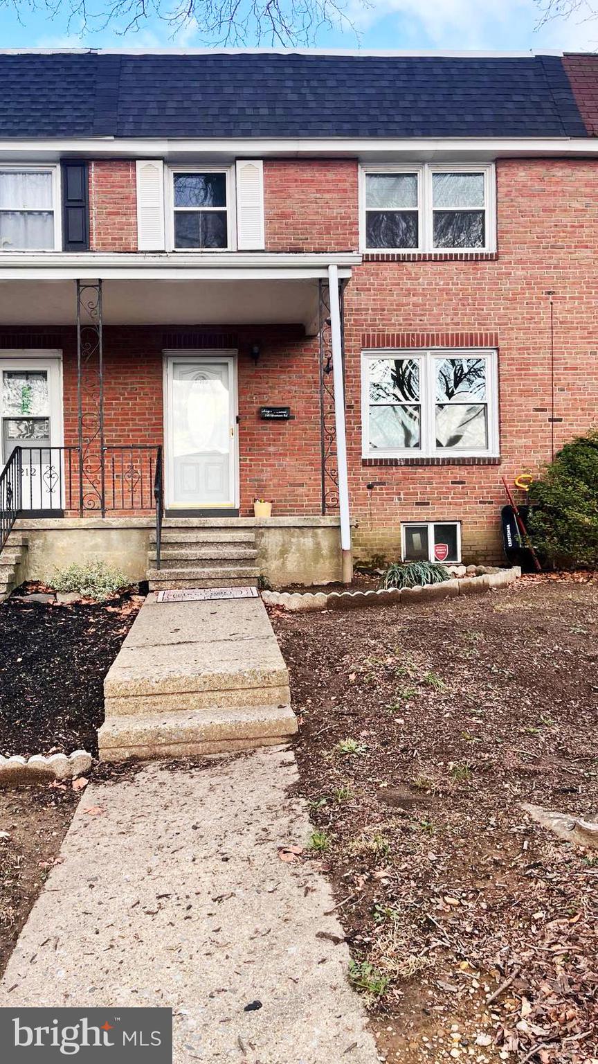 210 Sycamore Road Reading, PA 19611 - Photo 15 of 16 a front view of a house with a garden