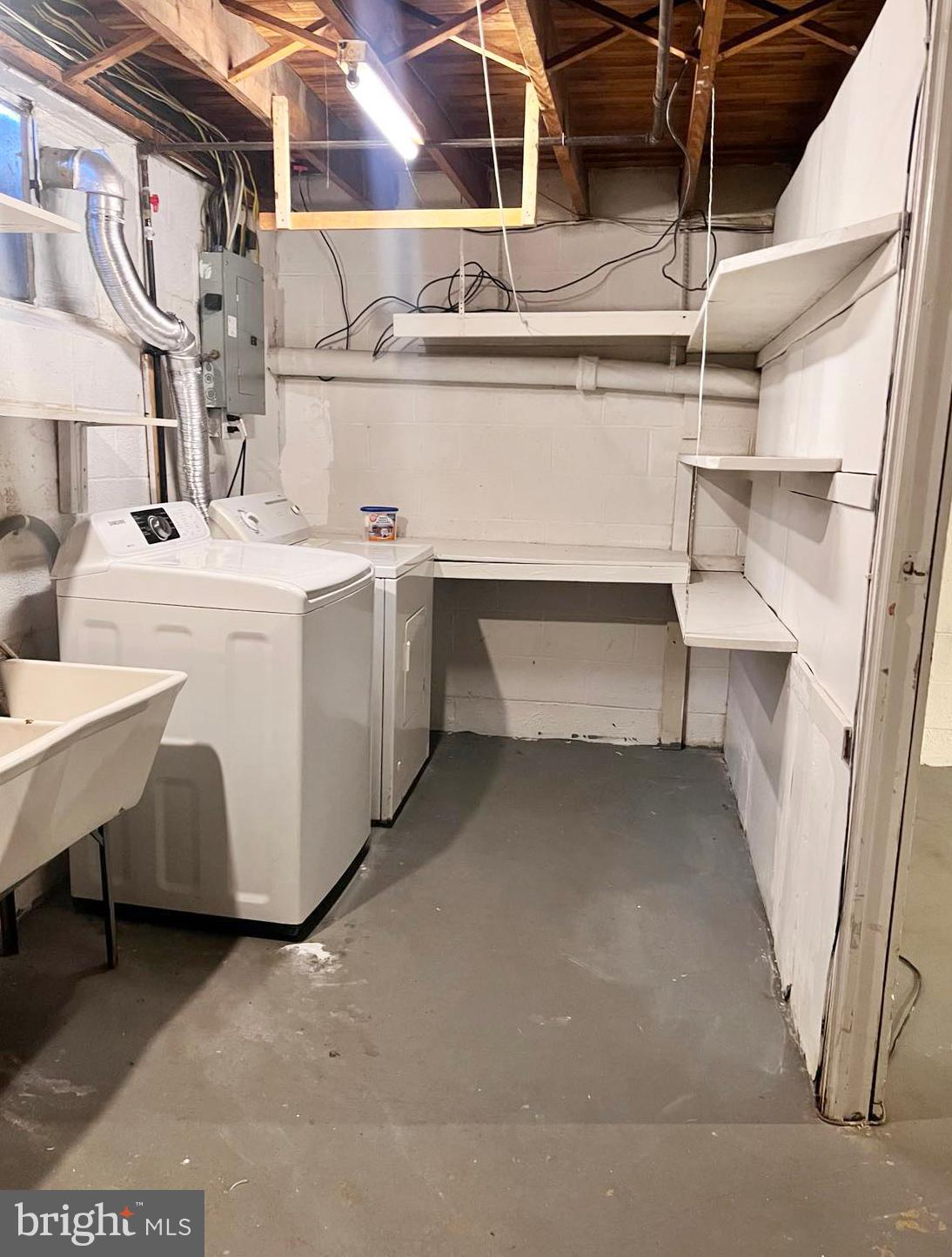 210 Sycamore Road Reading, PA 19611 - Photo 10 of 16 a utility room with dryer and washer