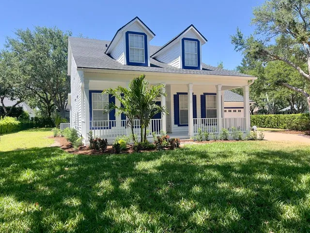 front view of a house with a small yard