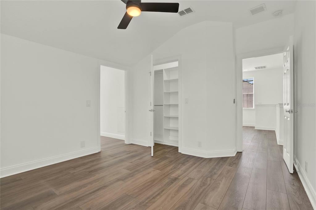 8418 Bowden Way Windermere, FL 34786 - Photo 16 of 31 wooden floor in an empty room