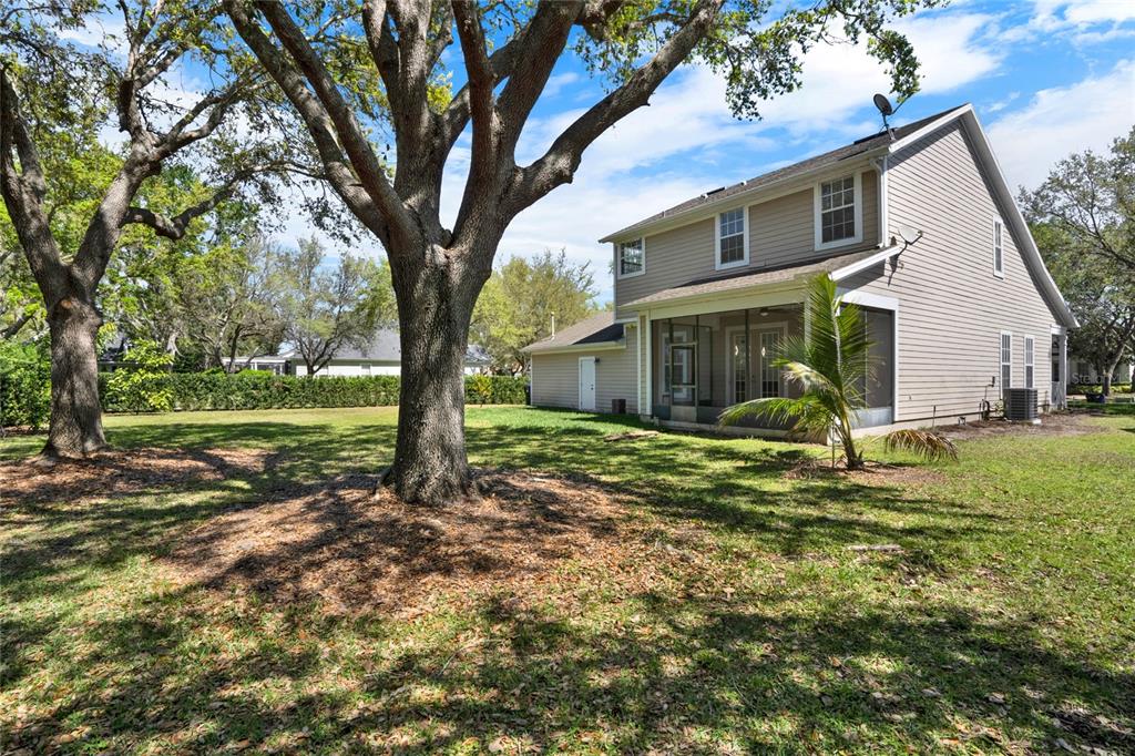 8418 Bowden Way Windermere, FL 34786 - Photo 27 of 31 a view of a house with a yard