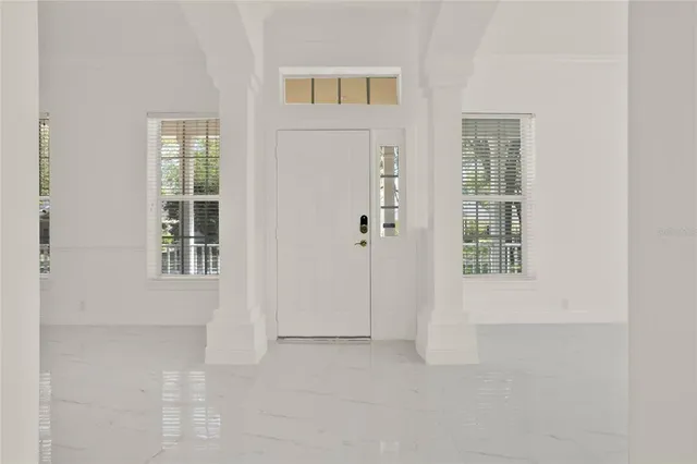 an empty room with windows