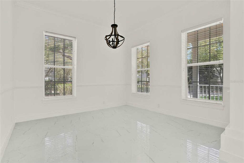 8418 Bowden Way Windermere, FL 34786 - Photo 9 of 31 an empty room with windows