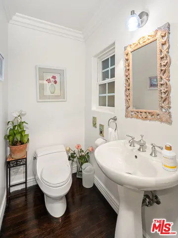 a bathroom with a sink and a toilet