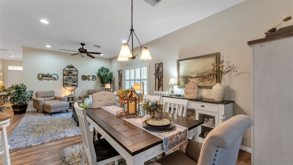 728 Canberra Road Winter Haven, FL 33884 - Photo 11 of 47 a view of a dining room with furniture