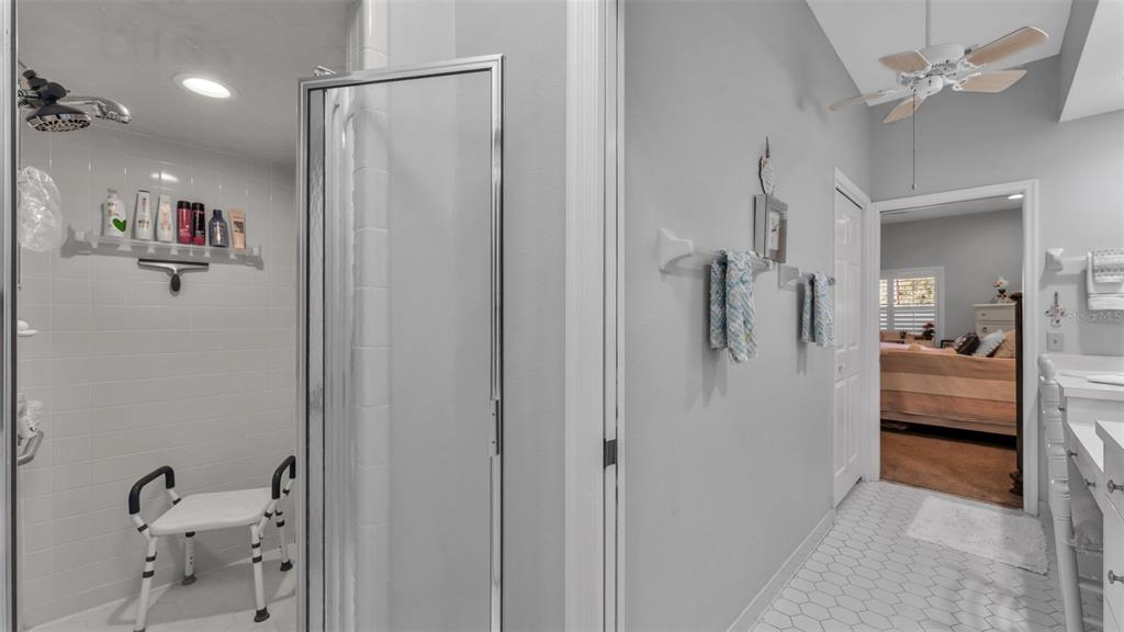 728 Canberra Road Winter Haven, FL 33884 - Photo 30 of 47 a bathroom with a shower and a sink