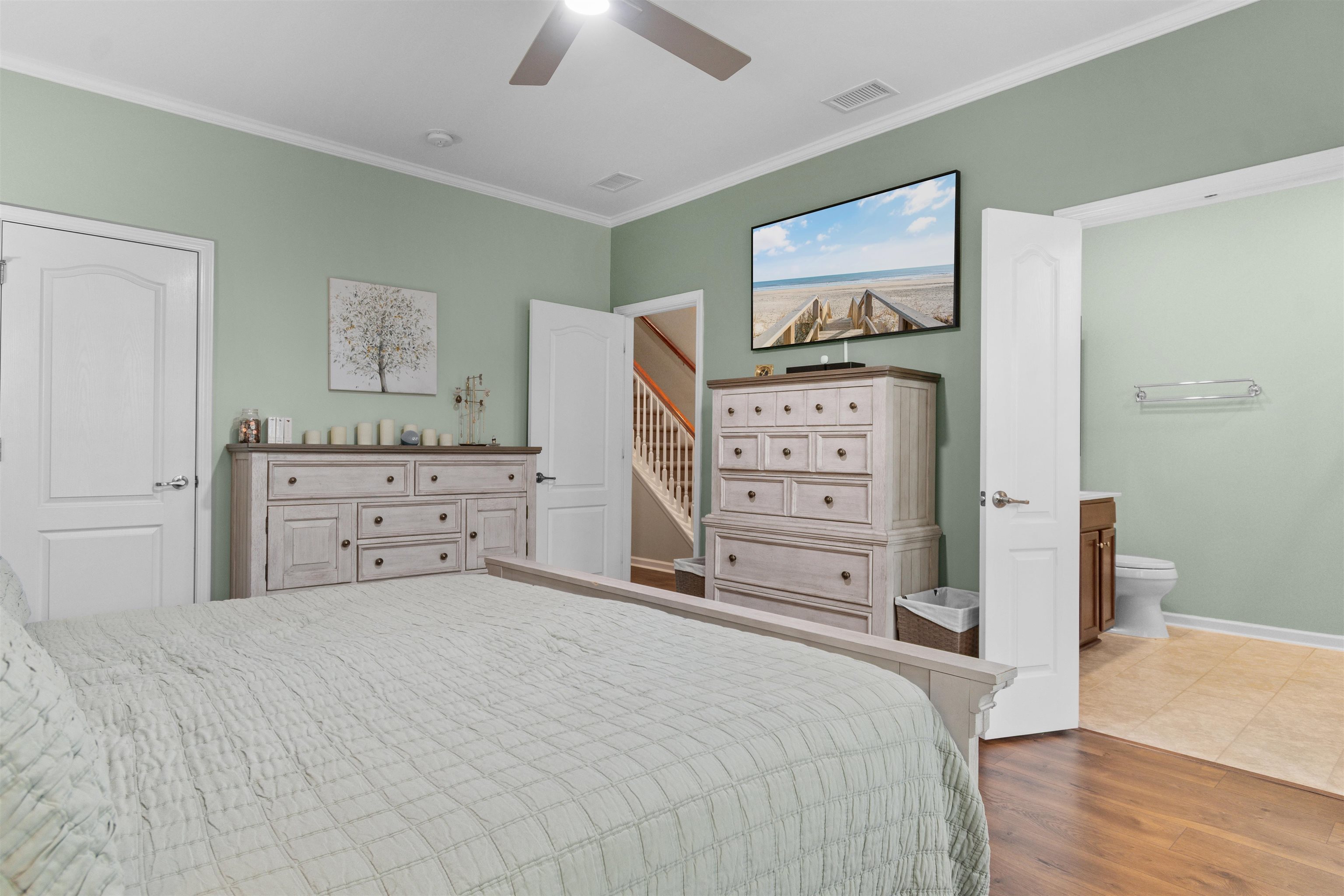 2408 Heritage Loop, Unit 2408 Myrtle Beach, SC 29577 - Photo 12 of 40 Bedroom with wood finished floors, crown molding, and ceiling fan