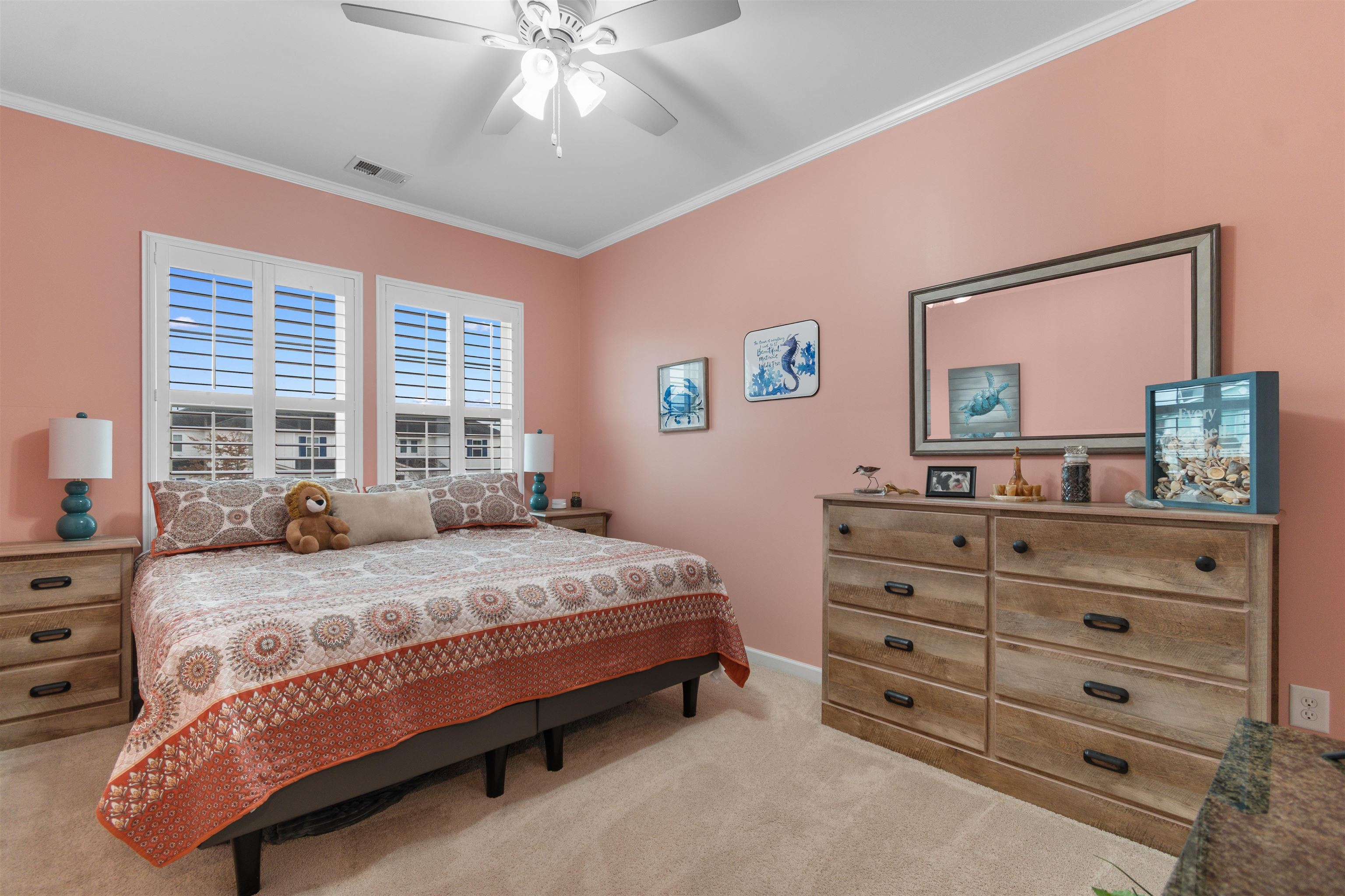 2408 Heritage Loop, Unit 2408 Myrtle Beach, SC 29577 - Photo 15 of 40 Bedroom featuring ornamental molding, ceiling fan, and light carpet