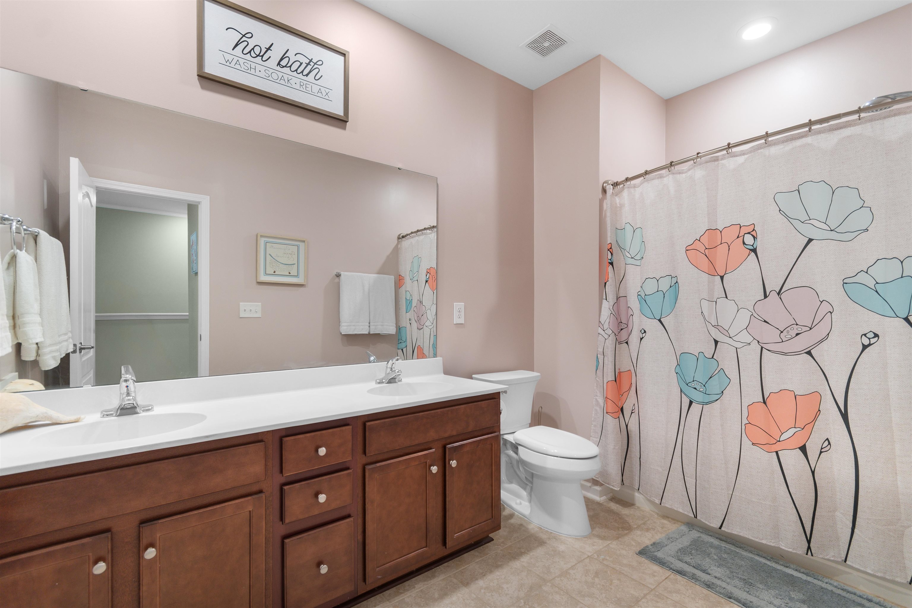2408 Heritage Loop, Unit 2408 Myrtle Beach, SC 29577 - Photo 17 of 40 Full bath featuring double vanity and light tile patterned floors