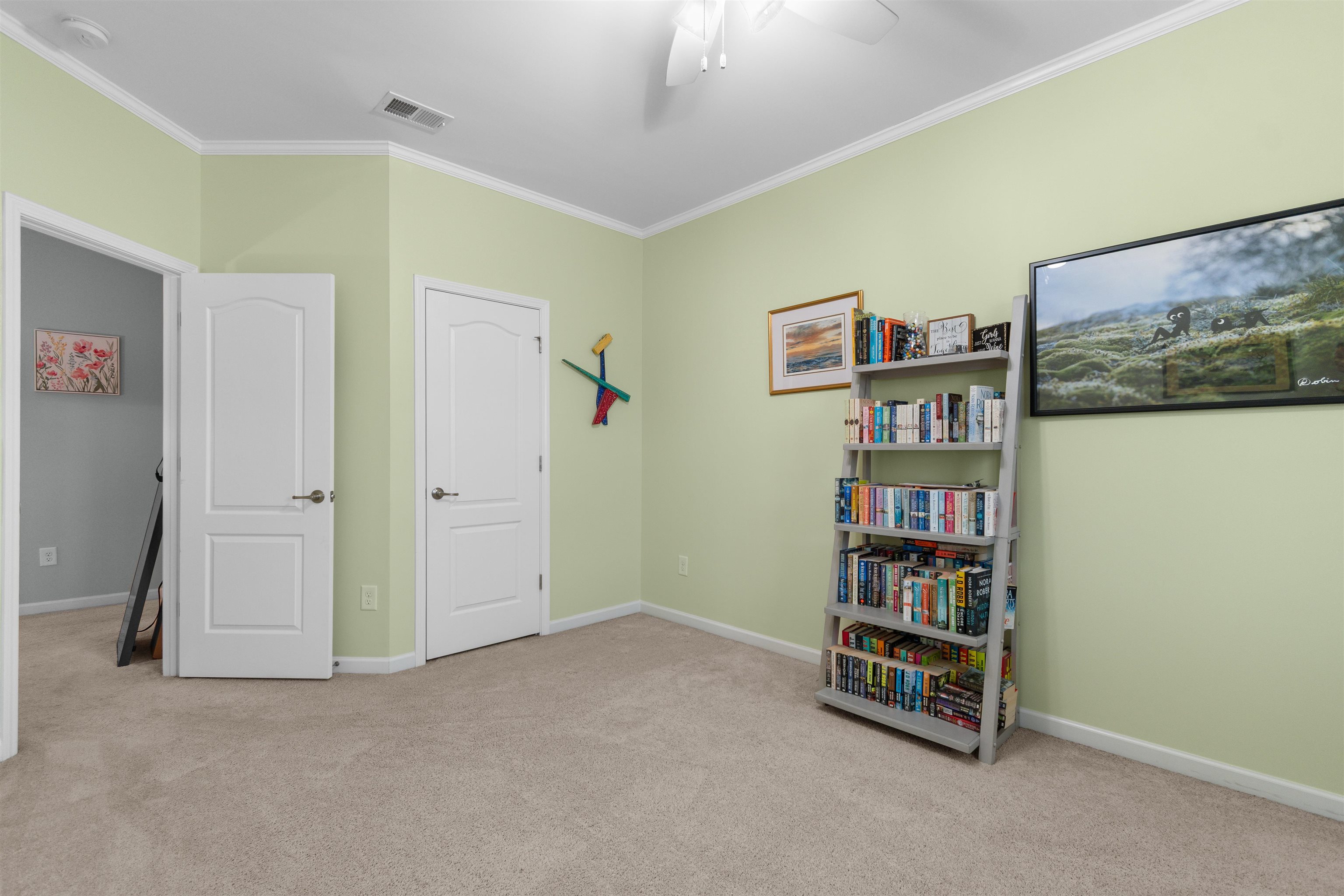 2408 Heritage Loop, Unit 2408 Myrtle Beach, SC 29577 - Photo 19 of 40 Bedroom with ornamental molding, light colored carpet, and ceiling fan