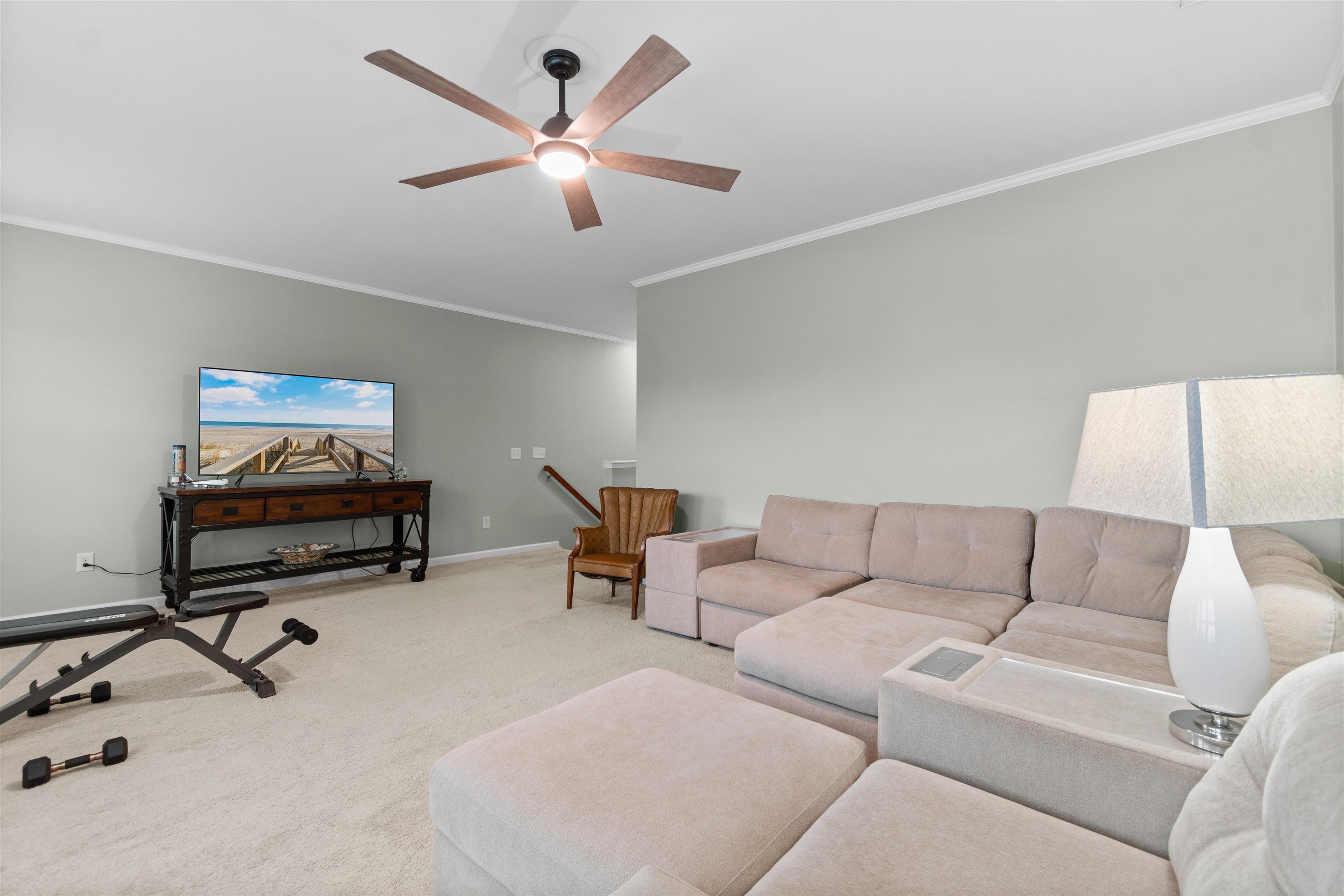 2408 Heritage Loop, Unit 2408 Myrtle Beach, SC 29577 - Photo 23 of 40 Carpeted living room with crown molding and a ceiling fan