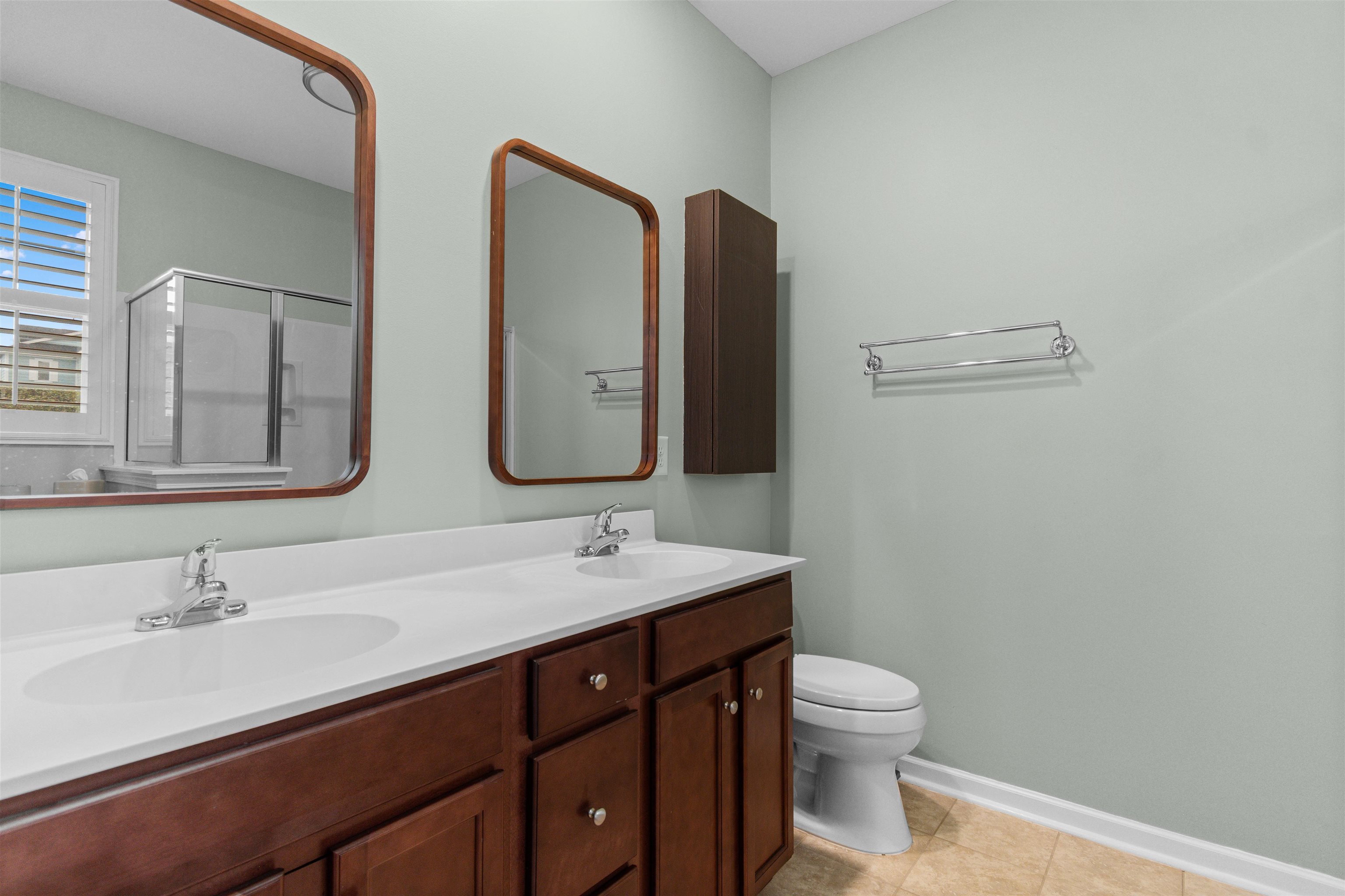2408 Heritage Loop, Unit 2408 Myrtle Beach, SC 29577 - Photo 24 of 40 Bathroom with a shower stall, double vanity, and light tile patterned flooring