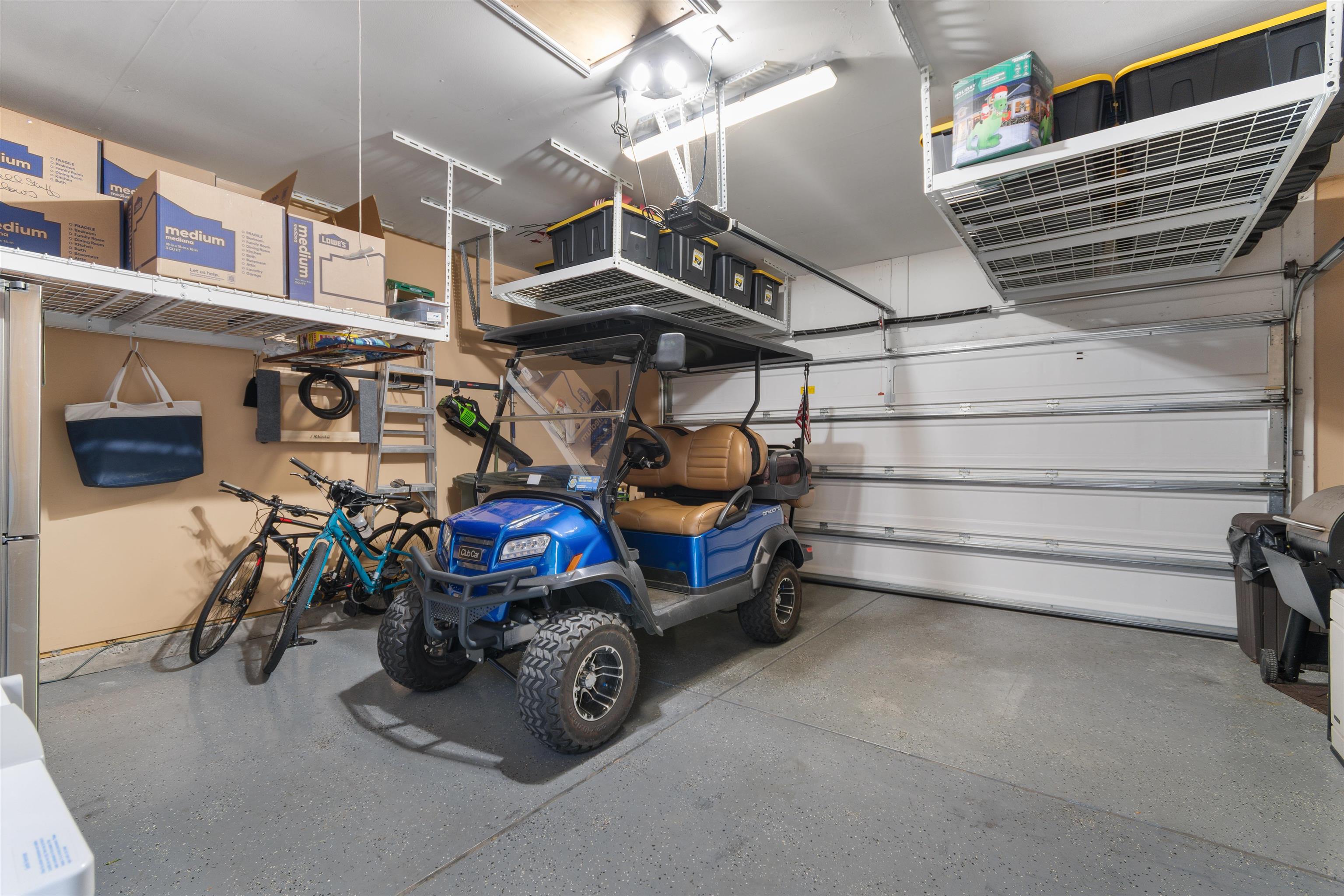 2408 Heritage Loop, Unit 2408 Myrtle Beach, SC 29577 - Photo 26 of 40 Garage featuring freestanding refrigerator