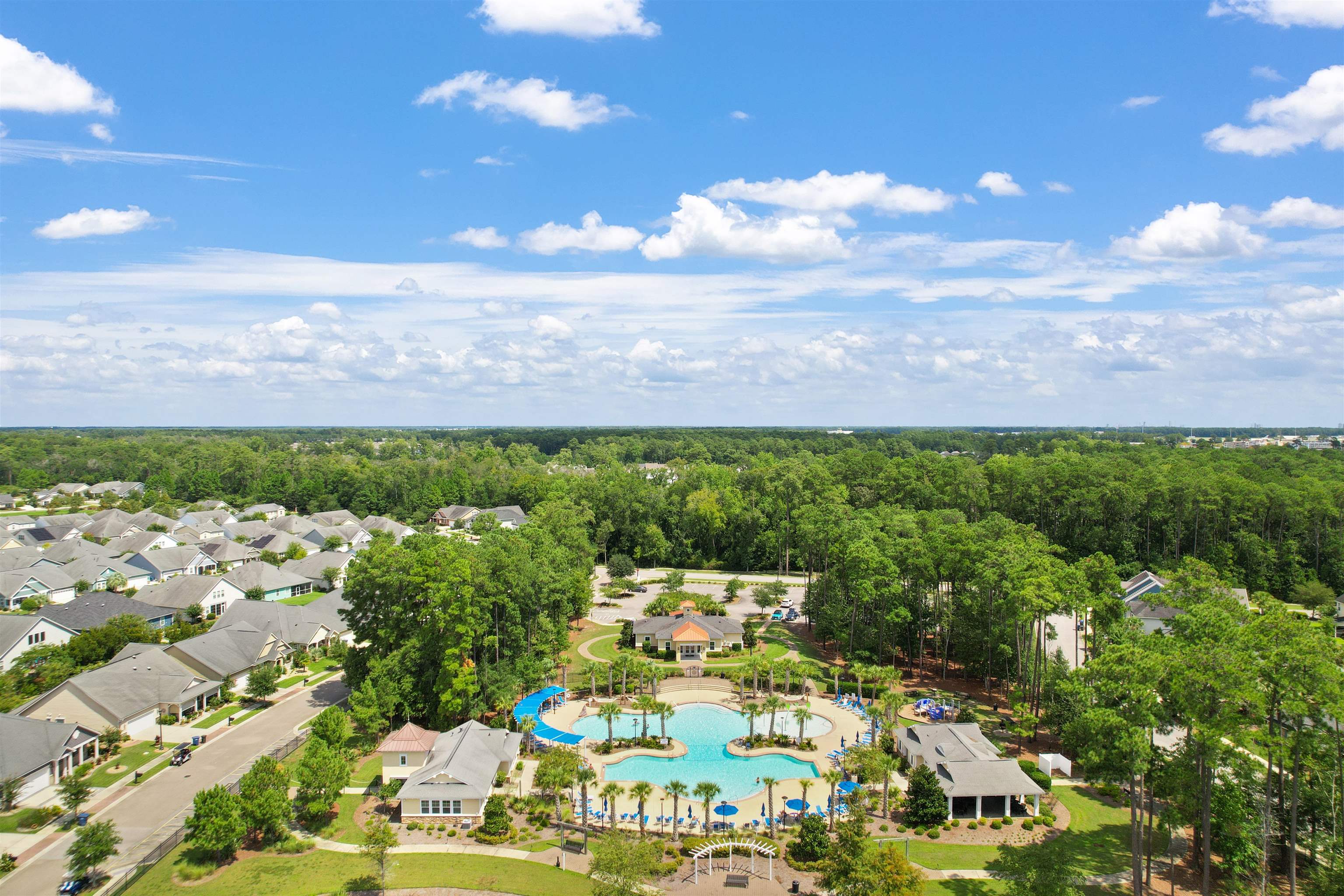 2408 Heritage Loop, Unit 2408 Myrtle Beach, SC 29577 - Photo 34 of 40 Drone / aerial view of a pool area