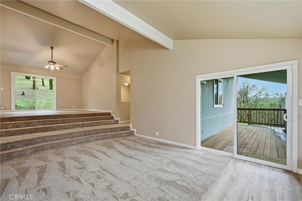 19474 Donkey Hill Road Hidden Valley Lake, CA 95467 - Photo 14 of 38 Living area has covered deck accessible through sliding glass door.
