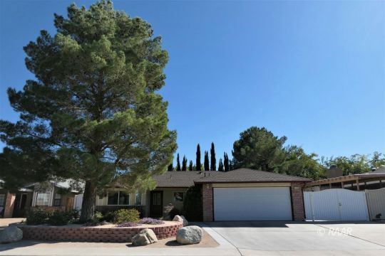 1122 North Inyo Street Ridgecrest, CA 93555 - Photo 34 of 34 a front view of a house with a garden