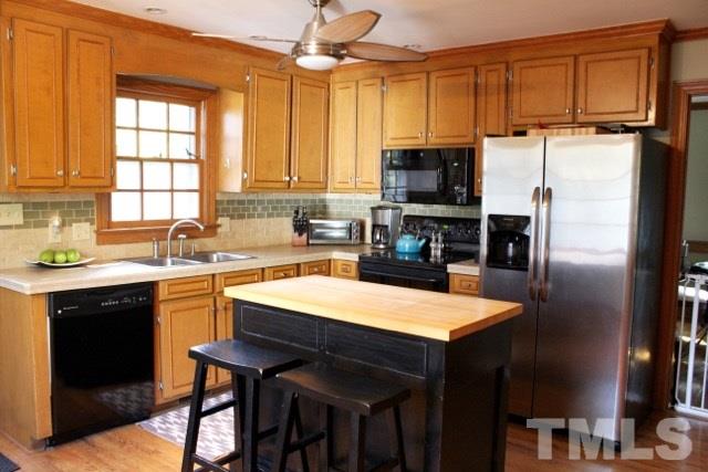 8809 Reigate Lane Raleigh, NC 27603 - Photo 7 of 19