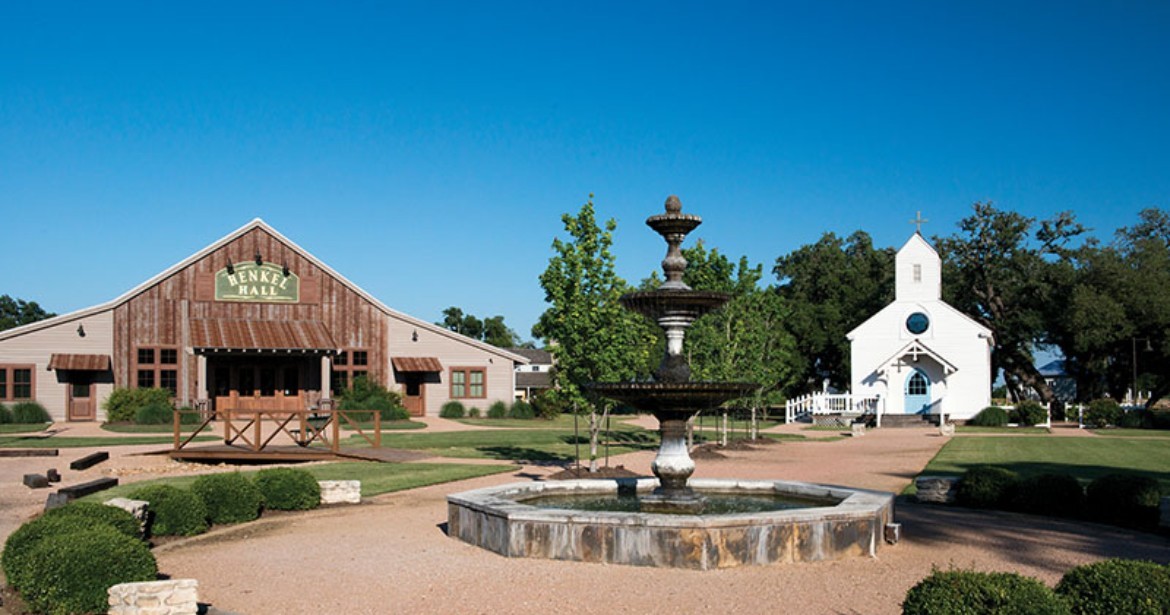 8080 Schuster Road Ledbetter, TX 78946 - Photo 5 of 8 a front view of a house with garden